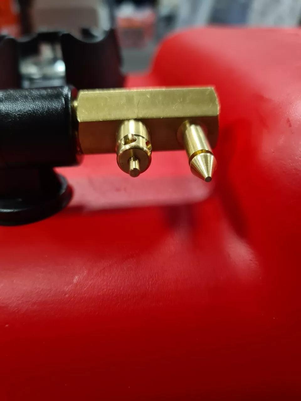 Close-up of the connector on a red 22-liter outboard fuel tank for marine applications
