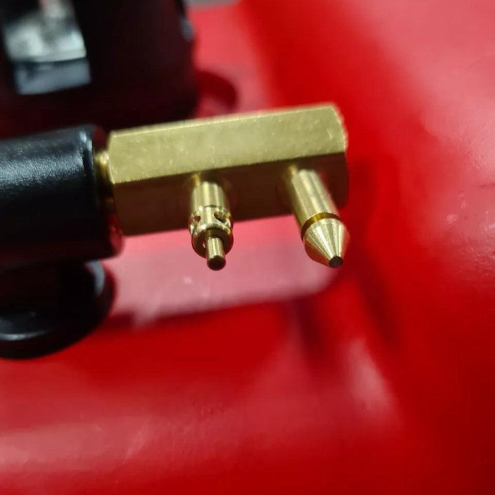 Close-up of brass fittings on a marine fuel tank 22L showing fuel line connections