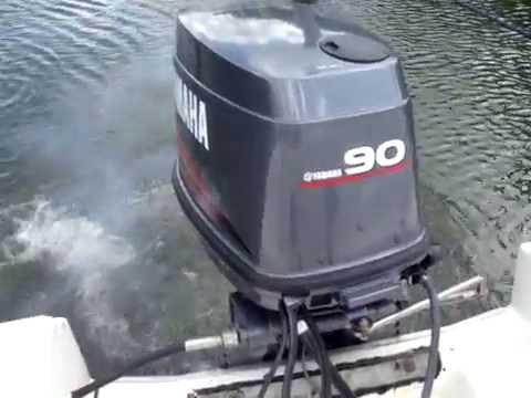 Yamaha 90 horsepower 2-stroke outboard engine running on a boat in water, marine parts from 4Boats UK