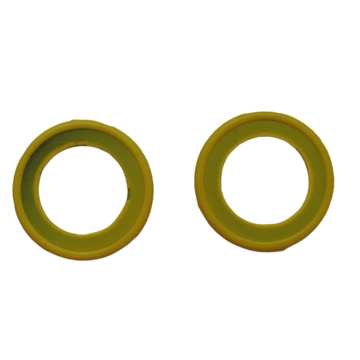Two yellow rubber washers on a white background