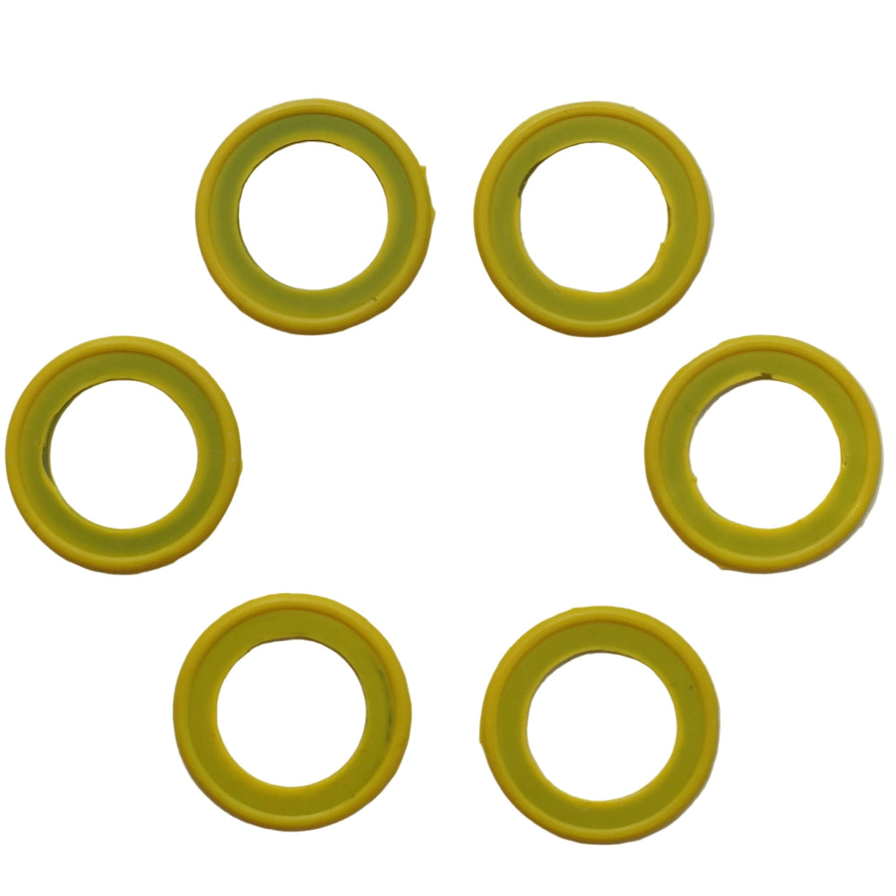 Six yellow rubber washers on a white background