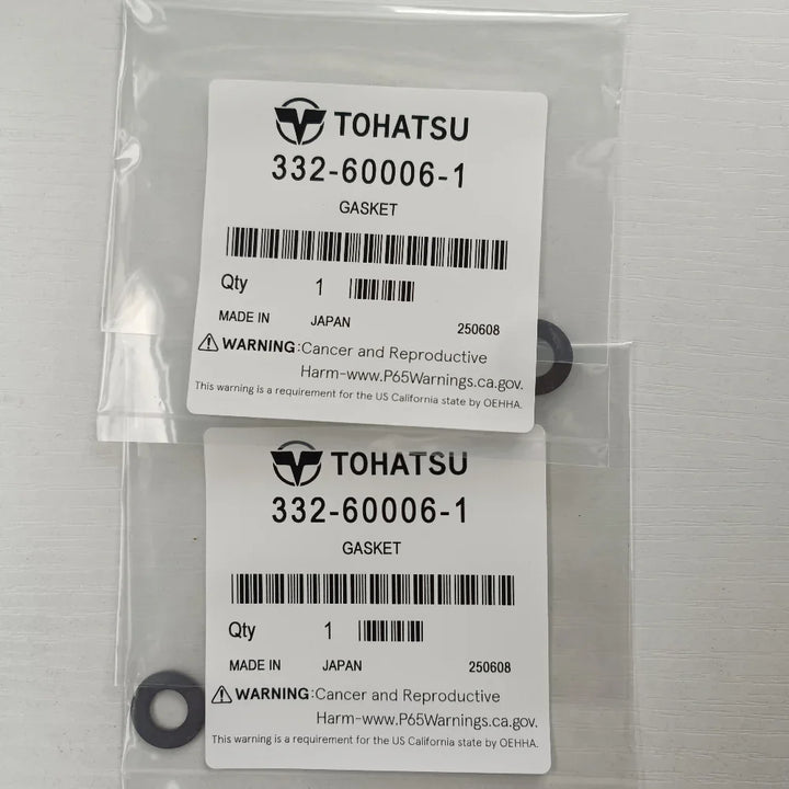 Two gaskets in a clear plastic bag with Tohatsu labels on a white background