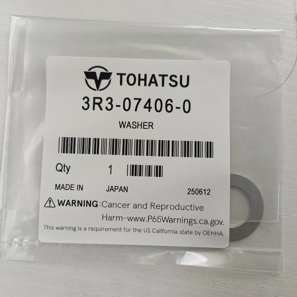 Tohatsu washer packaging with label and washer inside a clear plastic bag.
