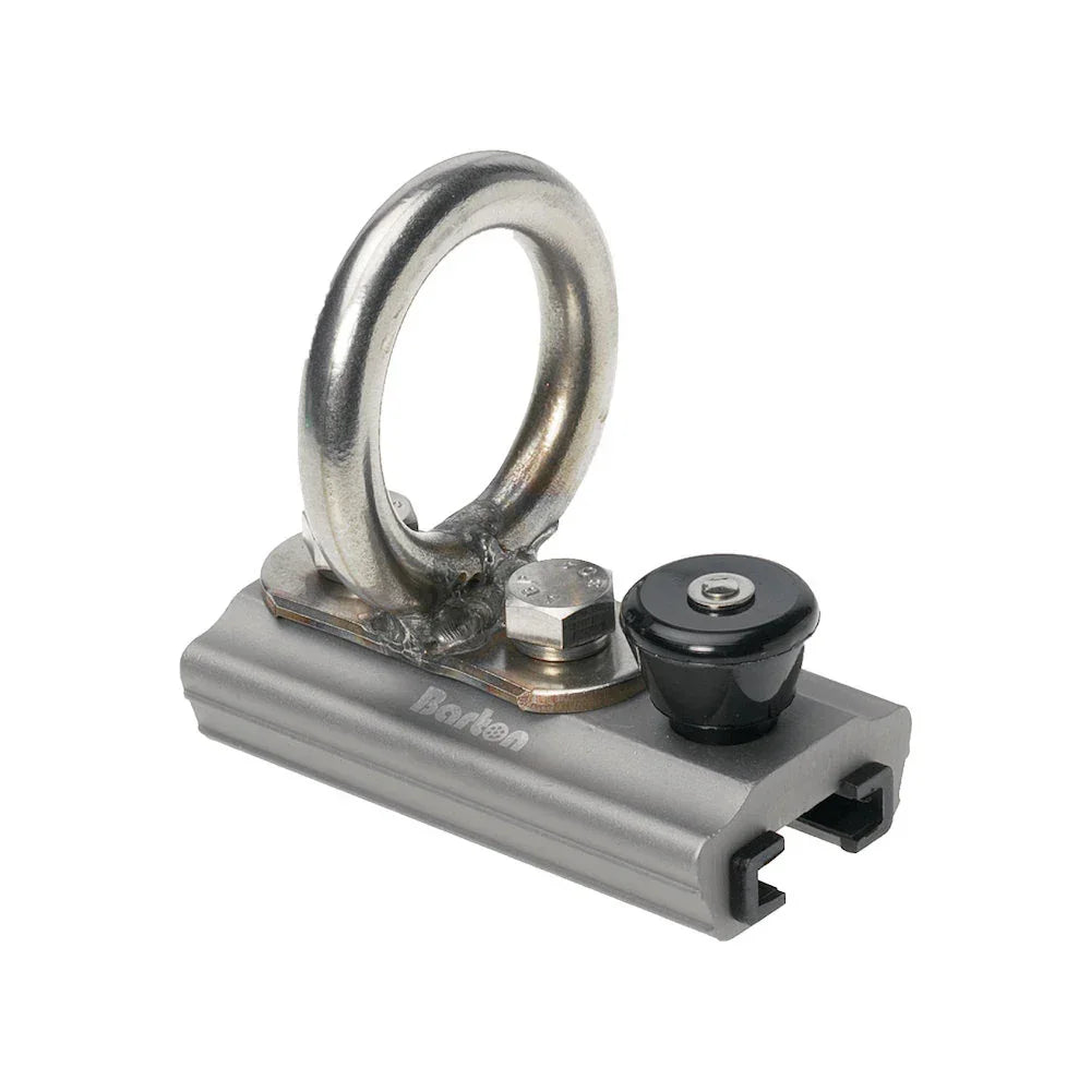 Metallic fishing lure with ring and base on a white background