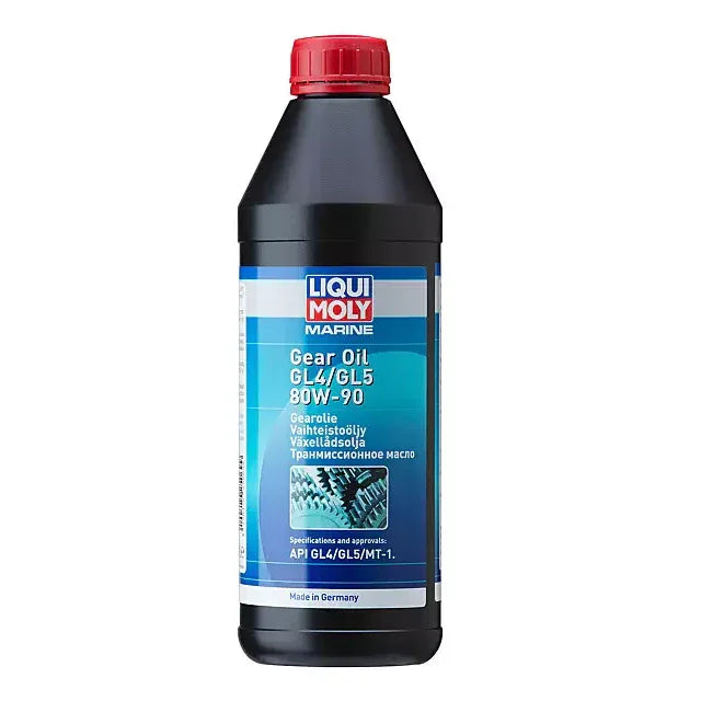 Bottle of gear oil with a red cap on a white background