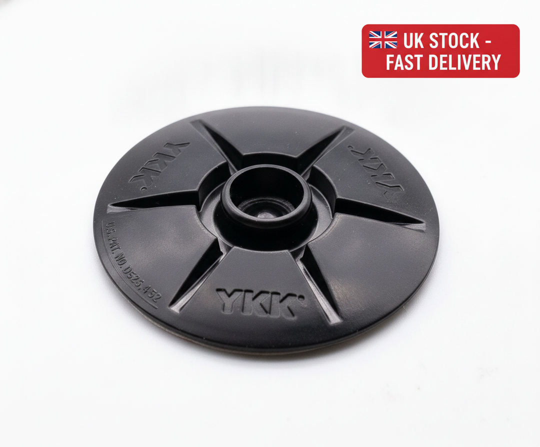 YKK Snad STUD 40mm black domed press snap self adhesive fastener - UK Stock image 1