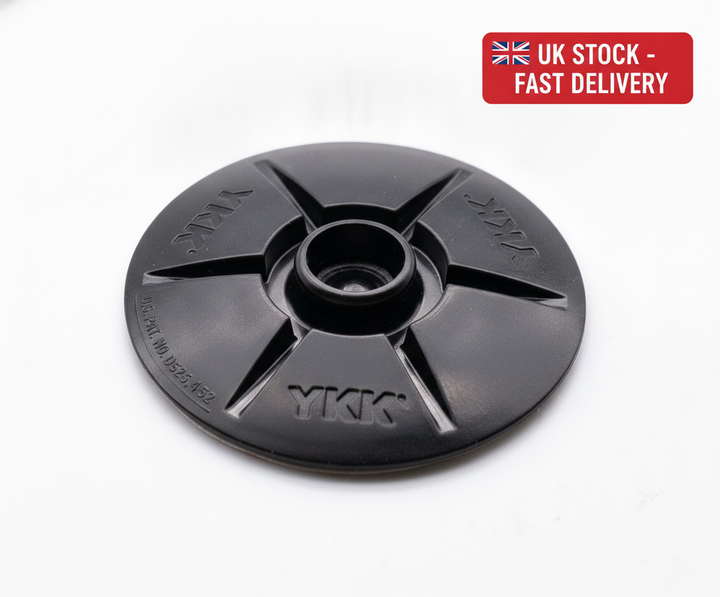 YKK Snad STUD 40mm black domed press snap self adhesive fastener - UK Stock image 1