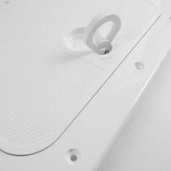 Close-up of a premium deck inspection hatch featuring a textured surface and a secure latch mechanism