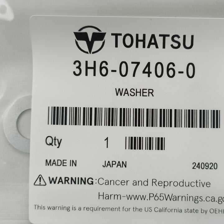 Packaged washer with Tohatsu label on a white background