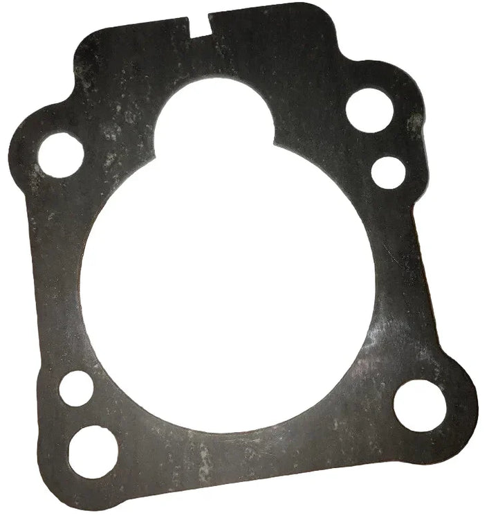 Gasket on a wooden surface with a white background